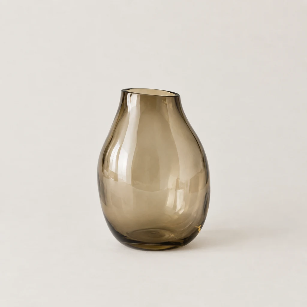 Rounded hand-blown smoked amber glass vase